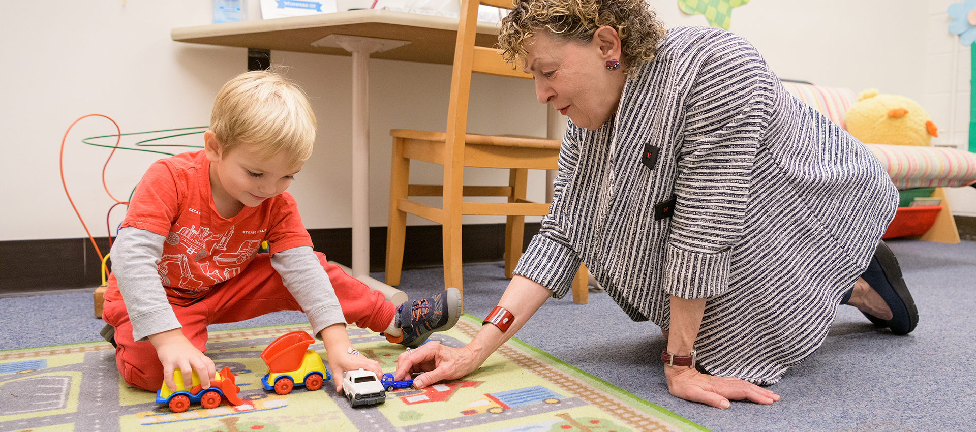 Roberta Golinkoff and child in lab